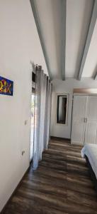 Posteľ alebo postele v izbe v ubytovaní Merlo House Dol Hvar