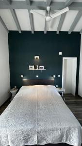 Posteľ alebo postele v izbe v ubytovaní Merlo House Dol Hvar