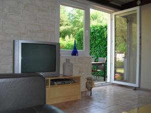 TV a/nebo společenská místnost v ubytování Ferienhaus Mika