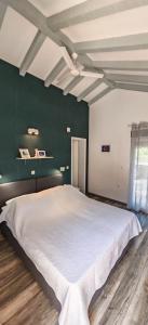 Posteľ alebo postele v izbe v ubytovaní Merlo House Dol Hvar