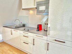 A cozinha ou kitchenette de Steiner Residences Mödling