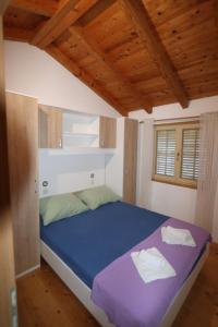 Posteľ alebo postele v izbe v ubytovaní Holiday Home Milan Borje