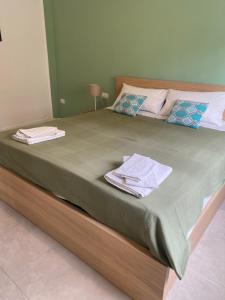 Letto o letti in una camera di Il Rosmarino