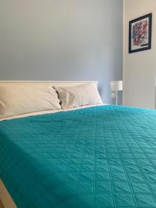 Letto o letti in una camera di Il Rosmarino