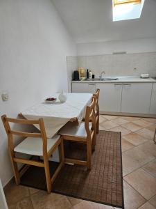 Kuchyň nebo kuchyňský kout v ubytování Apartments Petranic