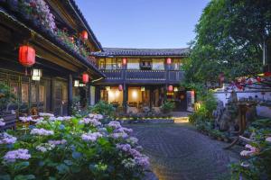 Zahrada ubytování Yiyuan Snow Mountain View Naxi Style Inn- Lijiang Old Town Mufu branch
