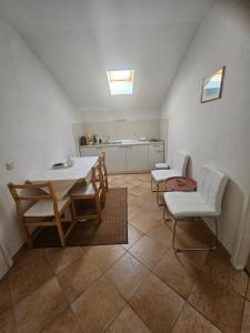 Kuchyň nebo kuchyňský kout v ubytování Apartments Petranic