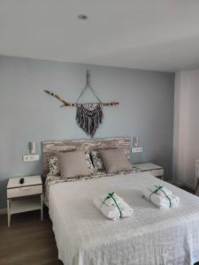 Postel nebo postele na pokoji v ubytování Can Costals Olivo