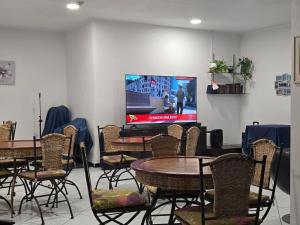 TV a/nebo společenská místnost v ubytování Gargano Hotel Helios