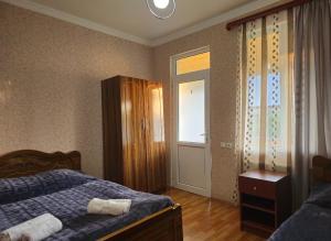 Postel nebo postele na pokoji v ubytování Tsemi Forest ცემი + 6 fotografií