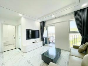 Un televizor și/sau centru de divertisment la Seahome Apartment - OC3 Mường Thanh Viễn Triều Nha Trang