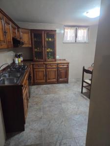 Kuchyň nebo kuchyňský kout v ubytování Villa Mirella