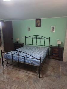Postel nebo postele na pokoji v ubytování Villa Mirella