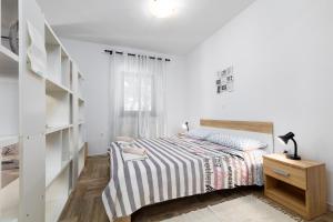 Postel nebo postele na pokoji v ubytování Apartments Snjezana by El-Pi Tours