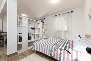 Postel nebo postele na pokoji v ubytování Apartments Snjezana by El-Pi Tours