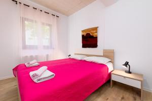 Postel nebo postele na pokoji v ubytování Apartments Snjezana by El-Pi Tours