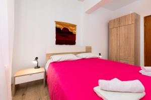Postel nebo postele na pokoji v ubytování Apartments Snjezana by El-Pi Tours