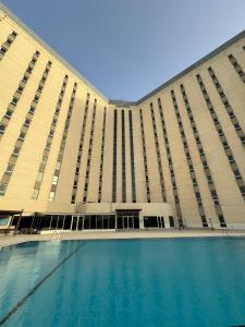 Bazén v ubytování AMR ACACIA Hotel nebo v jeho okolí