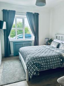 Postel nebo postele na pokoji v ubytování Connemara Ocean Escape
