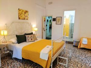 Posteľ alebo postele v izbe v ubytovaní B&B Perla
