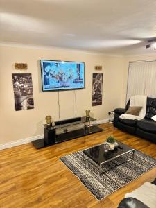 TV a/nebo společenská místnost v ubytování Cozy Two Bedroom in Welling