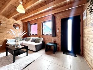 Χώρος καθιστικού στο REWAL domek do wynajęcia