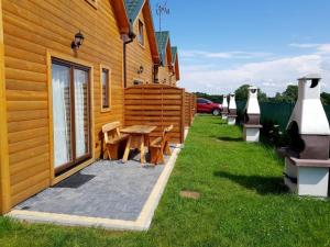 Κήπος έξω από το REWAL domek do wynajęcia