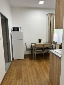 Kuchyň nebo kuchyňský kout v ubytování Apartmány Daros