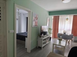 Posteľ alebo postele v izbe v ubytovaní M1 403 Frontal al Mar Vistas Terraza y Wifi