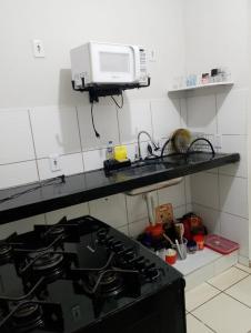Kuchyň nebo kuchyňský kout v ubytování Casa aconchegante