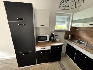 Dapur atau dapur kecil di Documenta Stadt Wohnung Kassel bis zu 5 Personen
