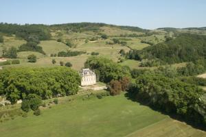an aerial view of a house in a field at Château de Crépol in Crépol +6 photos