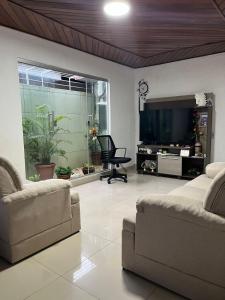 Et tv og/eller underholdning på Casa por temporada - Cop 30