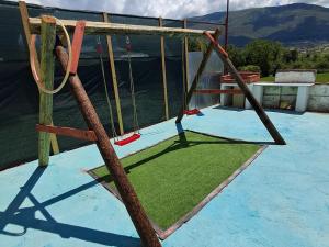 a swing set on top of a house at L'alba dei principi in Albanella