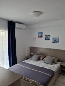 Postel nebo postele na pokoji v ubytování Breeze