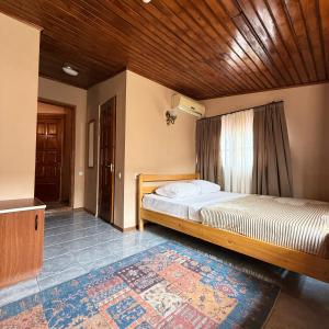 Postel nebo postele na pokoji v ubytování Babilina B&B