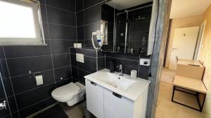 Un baño de Apartmani Mamić