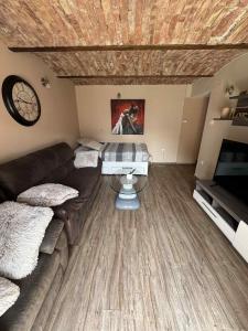 Posezení v ubytování Blue Sky Apartment