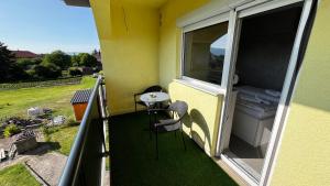 Un balcón o terraza en Apartmani Mamić