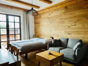 Postel nebo postele na pokoji v ubytování Strunzova Pila - apartmány s wellness 2,06 a 3,03
