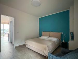 Postel nebo postele na pokoji v ubytování Appartamento Argentario