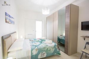 Postel nebo postele na pokoji v ubytování RC Apartment