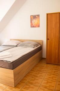 Postel nebo postele na pokoji v ubytování Dom Gościnny Zielono Mi