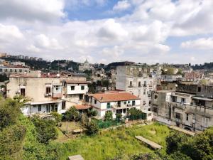 a group of buildings in a city at AlbaNova in Naples