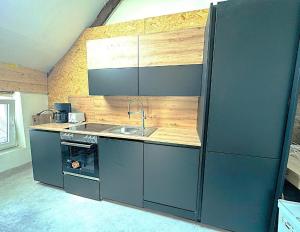 Kuchyň nebo kuchyňský kout v ubytování Vero Home