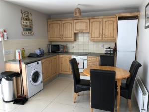 Kuchyň nebo kuchyňský kout v ubytování 27 old castlecourt portrush + 7 fotografií