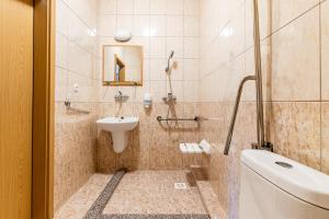 Vannituba majutusasutuses Garni Hotel Gavurky