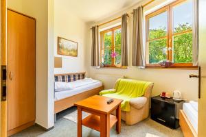 Voodi või voodid majutusasutuse Garni Hotel Gavurky toas