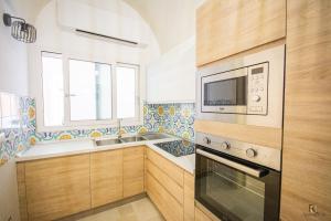 Kuchyň nebo kuchyňský kout v ubytování RC Apartment