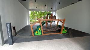 Ein Kinderspielbereich in der Unterkunft Agile Milestone service suite TRX by KL